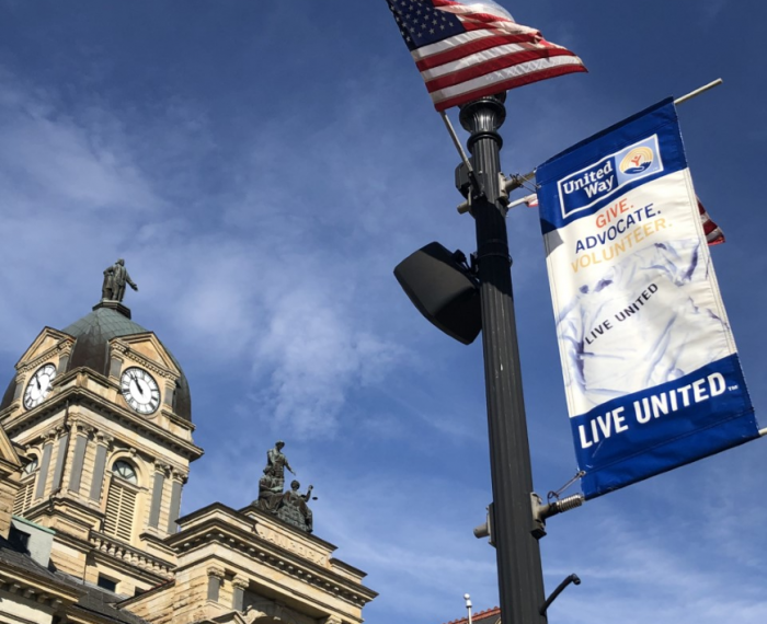 A United Way flag waves outside the courthouse