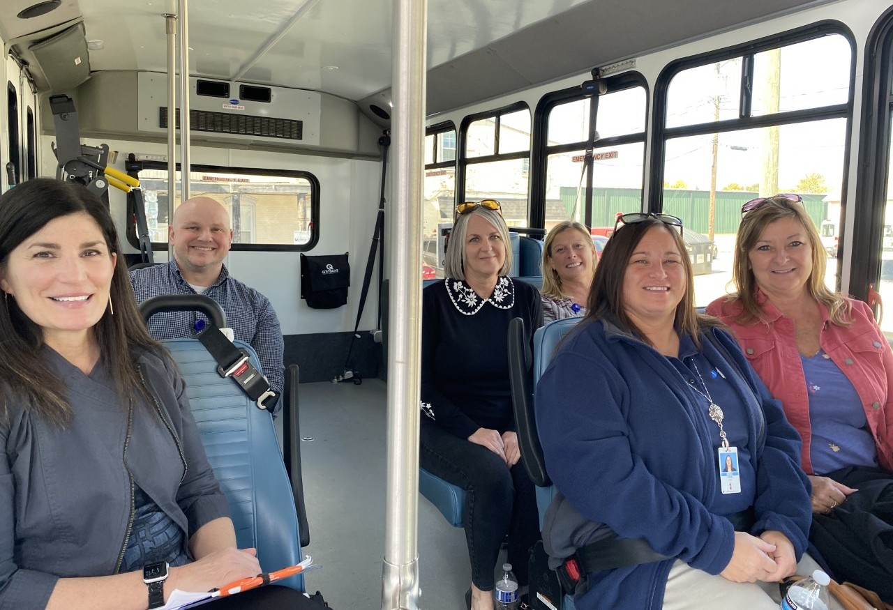 A group participates in a Difference Maker Tour
