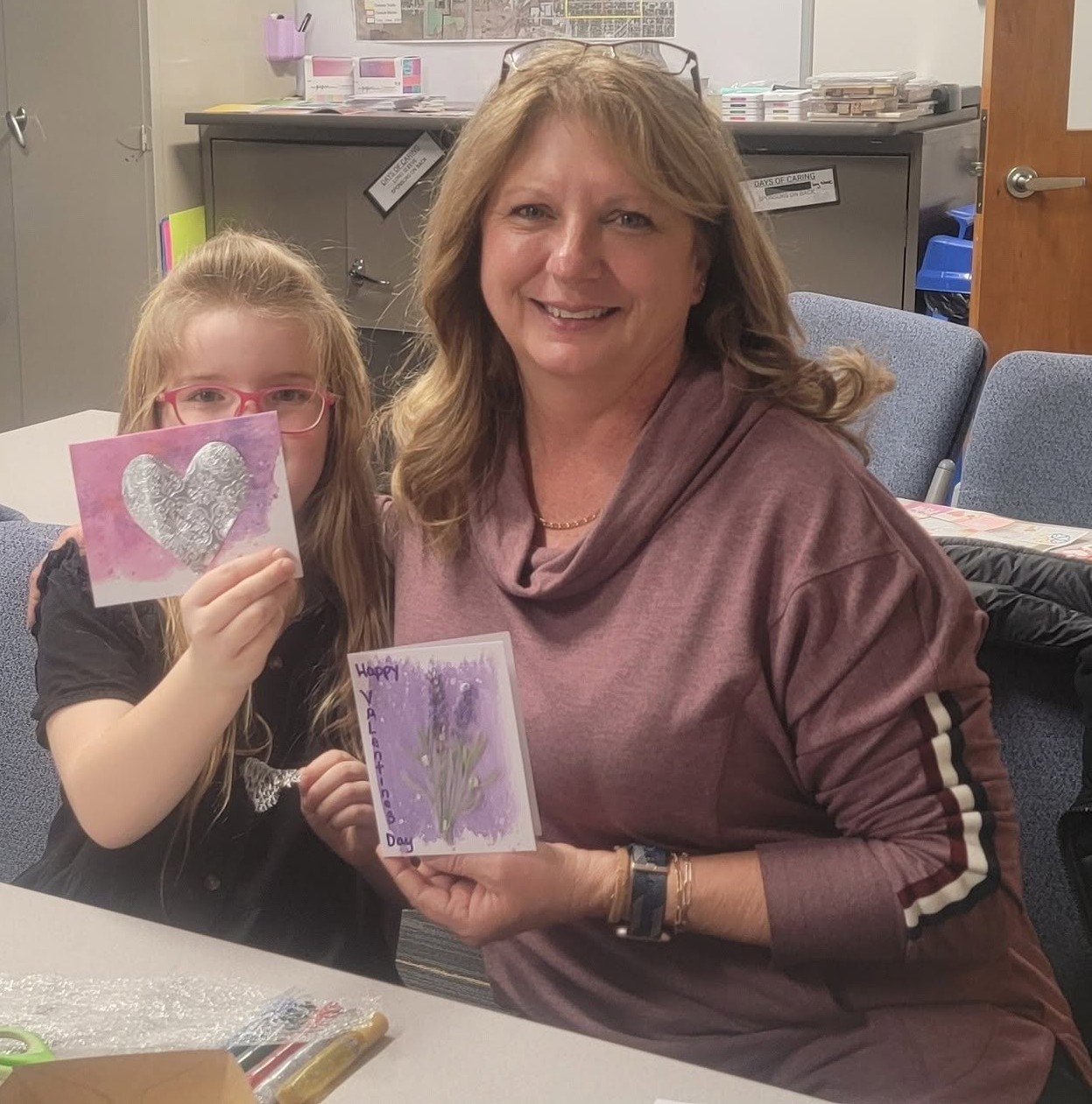 A family volunteers together at the United Way office