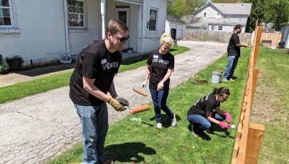 A group of volunteers completes a project for Spring Days of Caring 2022.
