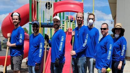 A Days of Caring team spruces up a local playground