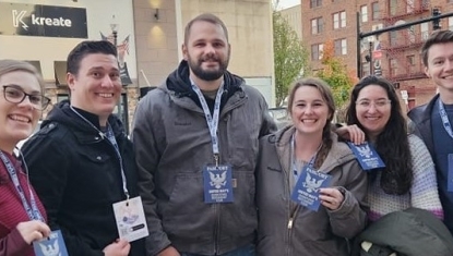 Restaurant Tour participants show off their Passports