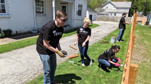 A group of volunteers completes a project for Spring Days of Caring 2022.
